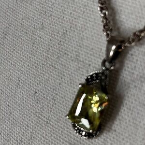 Peridot necklace with marcasites on top and bottom of pendant